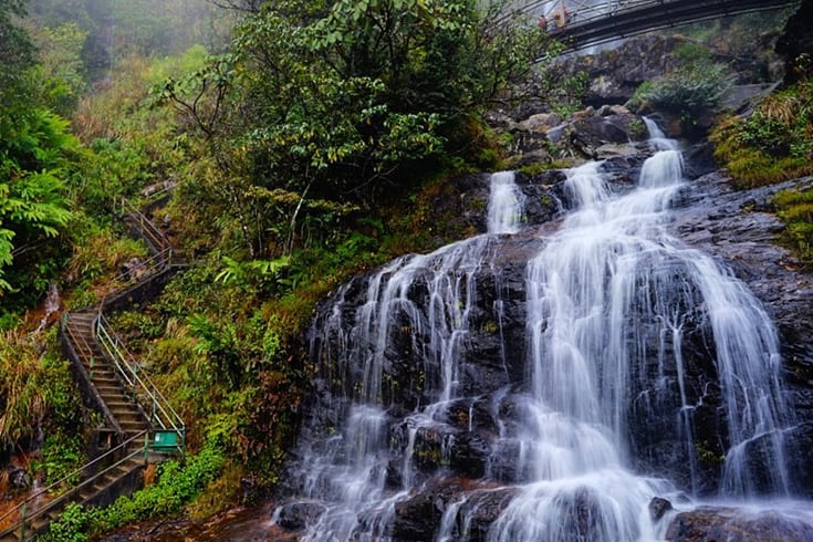 Climb on the staircase to discover Thac Bac Waterfall