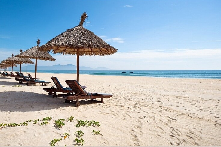 Sunbathe and swim at An Bang beach